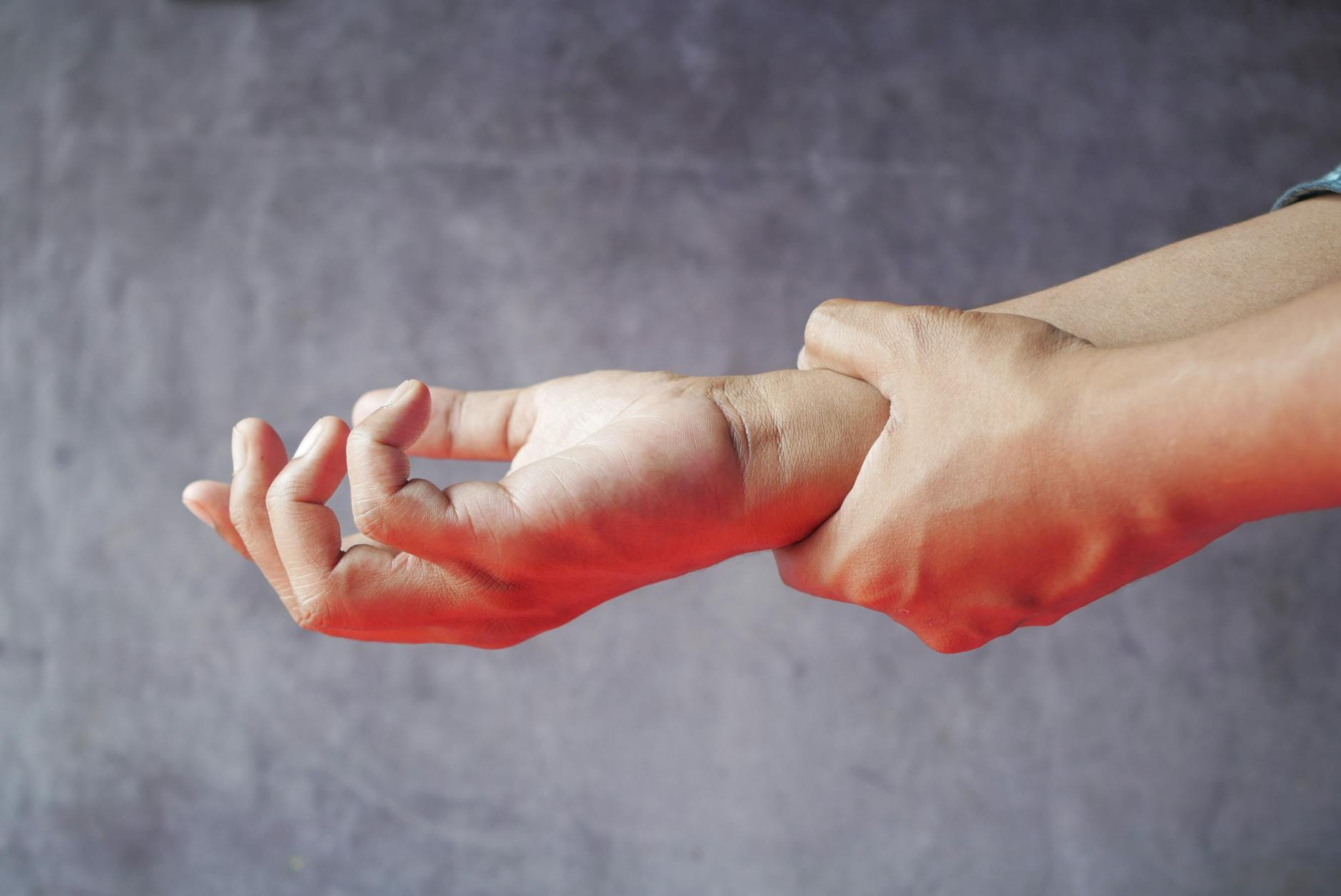 a person holding own hand